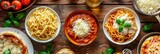 A table full of different types of pasta dishes, including spaghetti, macaroni, and lasagna
