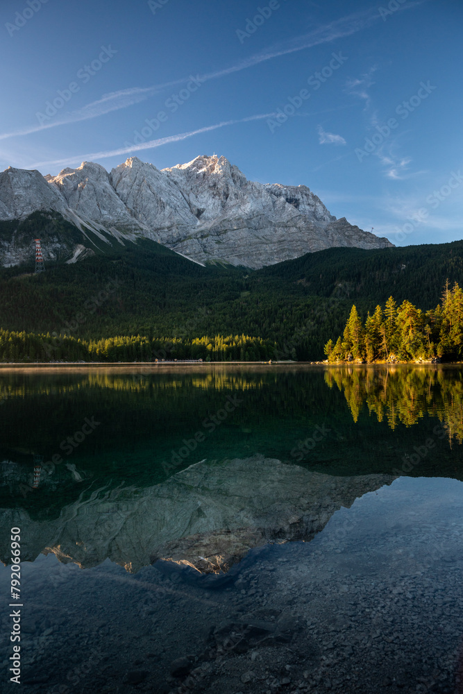 Fototapeta premium Lake eibsee at dawn with still water reflection