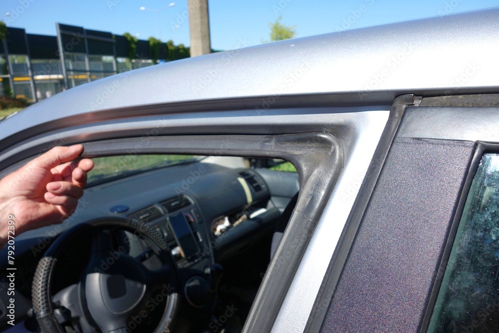 The rubber window frame curves over time The rubber window frame curves over time