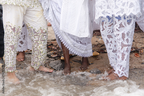 Members of Candomble are seen participating in the tribute to iemanja on Itapema beach in the city of Santo Amaro, Bahia. photo