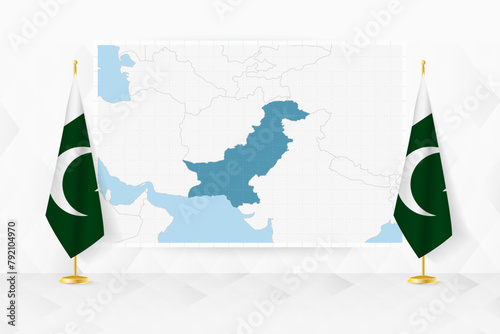 Map of Pakistan and flags of Pakistan on flag stand.