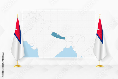 Map of Nepal and flags of Nepal on flag stand.