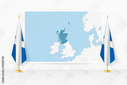 Map of Scotland and flags of Scotland on flag stand. photo