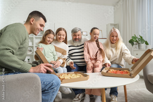 Big family eating pizza at ...