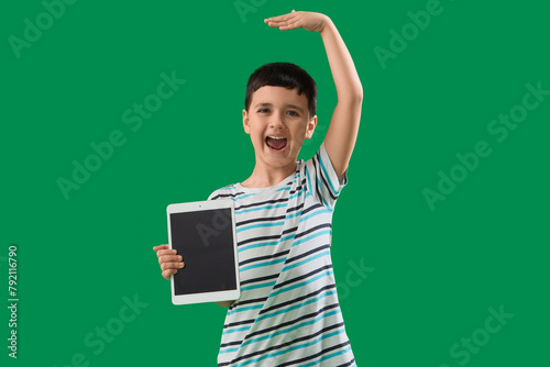 Cute little boy with tablet...