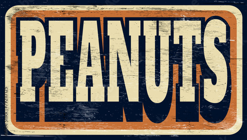 Aged vintage peanuts sign on wood