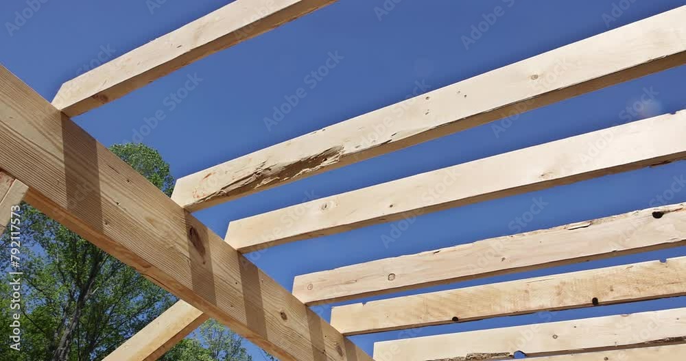 New house with wooden framing, beams, studs, an unfinished interior