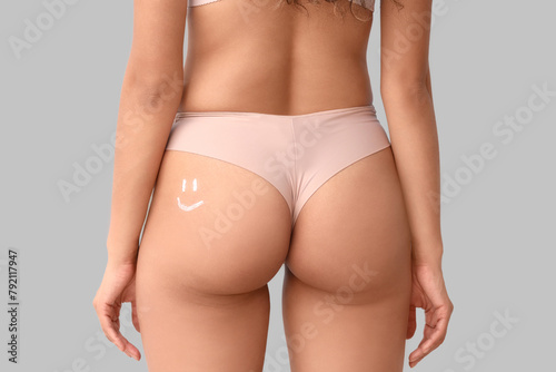 Woman's back view with crea...