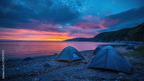 Blue Tents on seashore at sunset, Cape Breton Island, Canada.