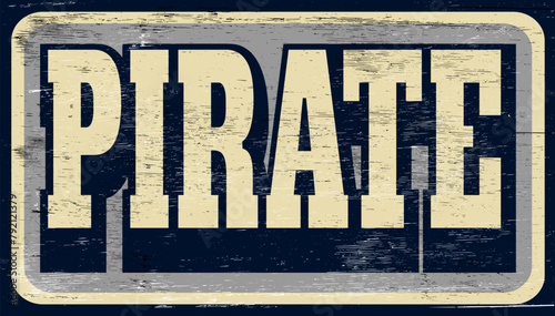 Aged and worn pirate sign on wood
