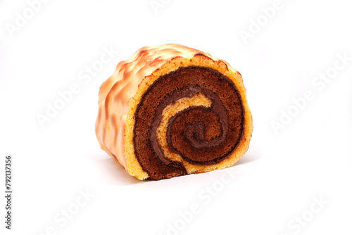 Tiger skin swiss roll cake isolated on white background. Bakery product photography