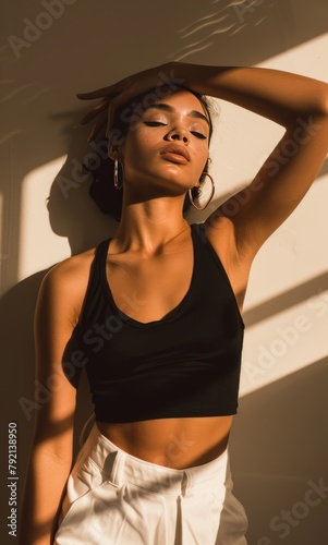 Woman in Black Top and White Shorts