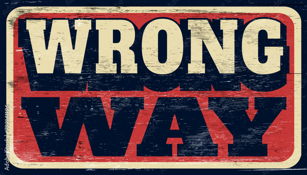 Fototapeta premium Aged and worn vintage wrong way sign on wood