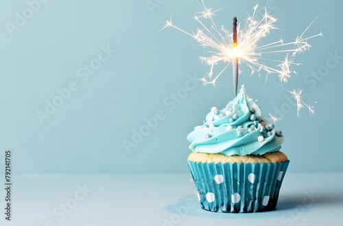 Cupcake With Blue Frosting and Sparkler