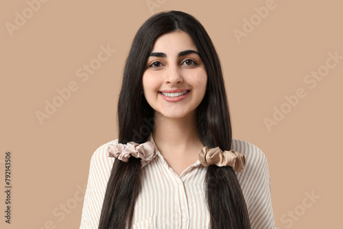 Happy woman with ponytails ...