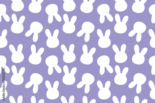 Seamless pattern with simple white recognizable bunny, rabbit silhouette on purple background. Vector handwritten illustration for baby, kids, fabrics photo