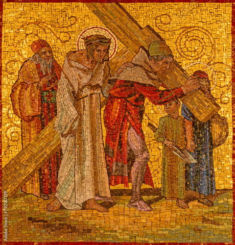 MILAN, ITALY - MARCH 4, 2024: The mosaic  Simon of Cyrene helps Jesus carry the cross as part of Cross way station in the church Chiesa di San Agostino by unknown artist of 20. cent. © Renáta Sedmáková