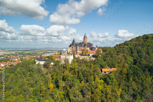 Historic Wernigerode Castle surrounded by an autumn landscape