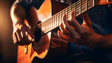 A close-up of a guitarist's hands strumming chords