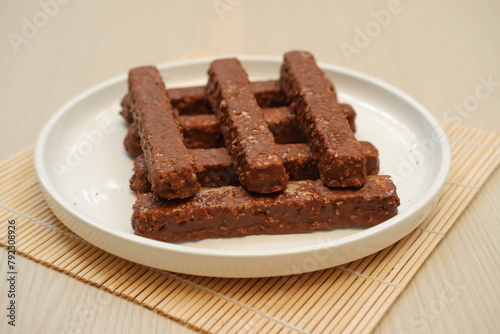 Chocolate wafers on a white plate, close-up