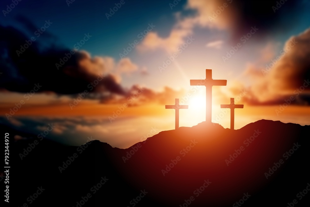 Golgotha hill with dramatic sky and wooden cross