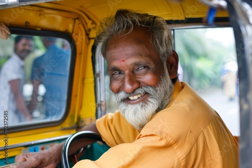 Indian rickshaw driver photo