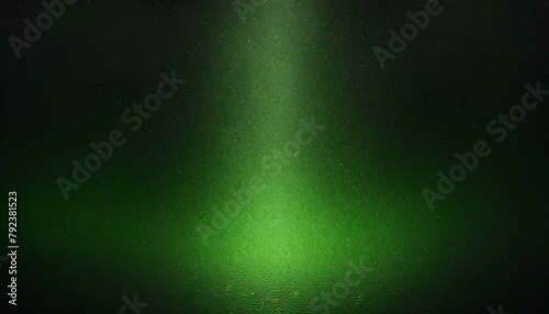 Glowing Green Blurred Light Gradient on Dark Grainy Black Background with Light Spot and Space for Text