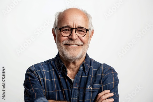 Mature man smiling for photo on white background