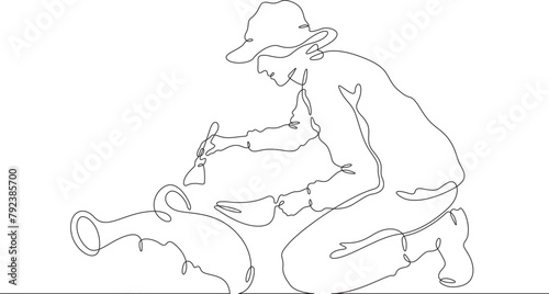 Archaeologist at an excavation. An archaeologist with tools in hand conducts historical research. Historian. Archeology. One continuous line . Line art. Minimal single line.White background. One line 