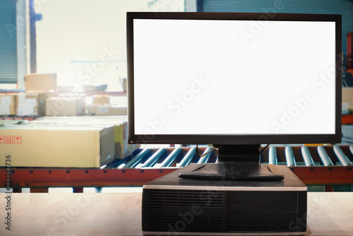 Computer Blank Screen on Table in Warehouse. Package Boxes. Warehouse Inventory management. Distribution Shipment Boxes. Supply Chain. Warehouse Shipping. Supplies Warehouse Logistics.