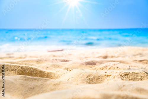 Nature of the beach and sea Summer with sunshine, sandy beaches, clear blue waters sparkling against the blue sky. On an island with good ecology and environment Background for summer vacation concept