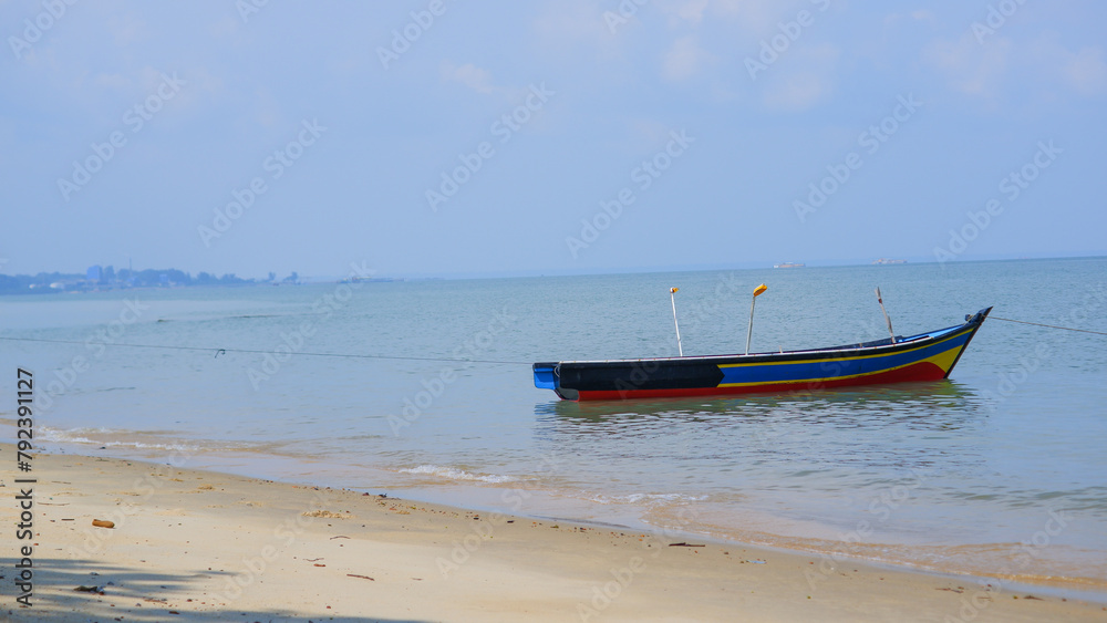 A Traditional Fishing Boat On The Coast Of Tanjung Kalian, Indonesia