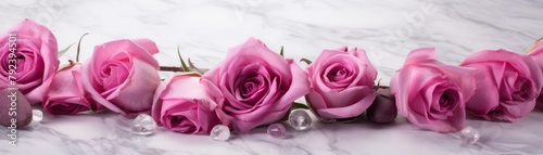 Romantic deep pink roses accentuating colored stone bracelets  showcased on an elegant marble background for upscale advertising