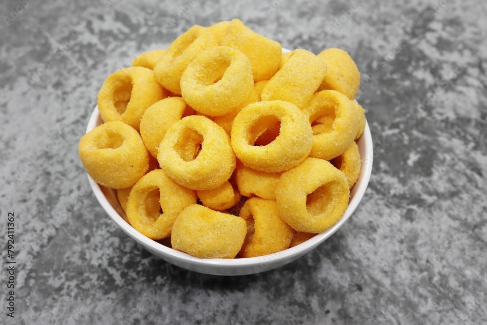 Cheese Ring Snack in bowl, close up high angle view