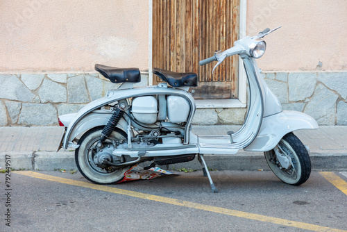 old scooter on the street, a very popular means of transport in Italy