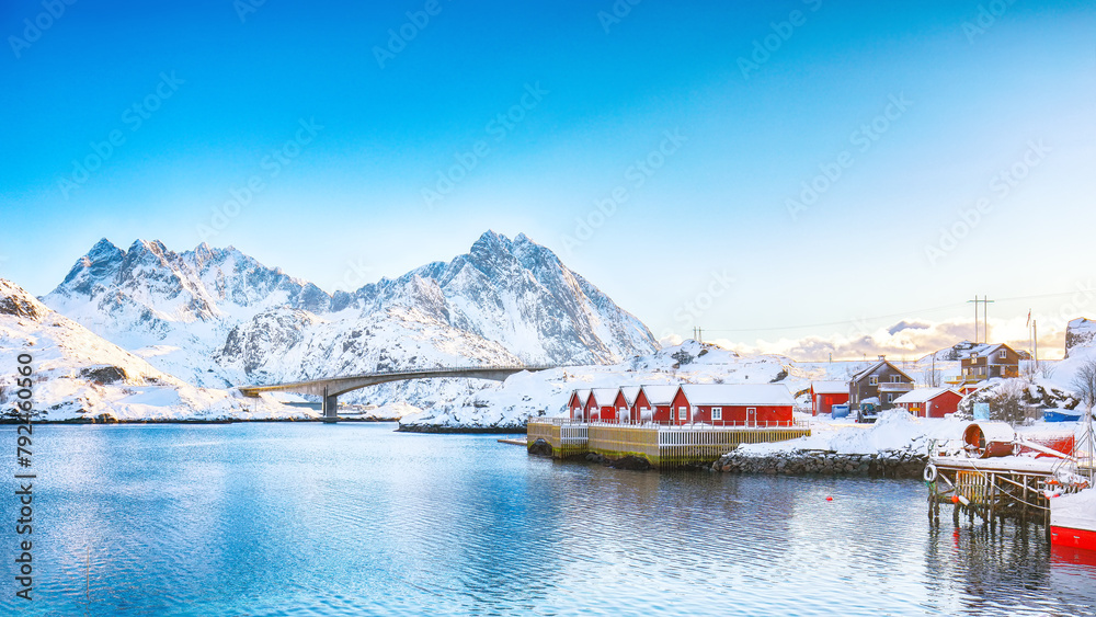 Winter view of small fishing village on Sundstraumen strait and Kakern Bridge