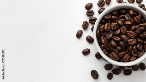 Coffee beans in a white bowl on a white table, space on the left, aerial view