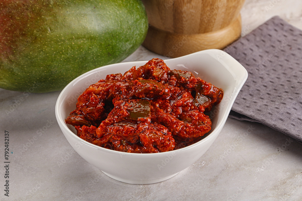 Spicy pickled raw green mango