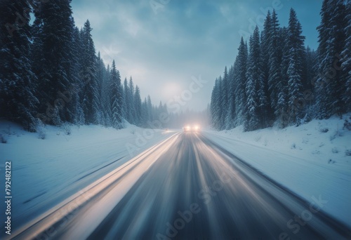 'blurred dangerous winter snowy highway blur driving conditions motion speed visualizies dynamics road snowfall car warning snowflake danger'