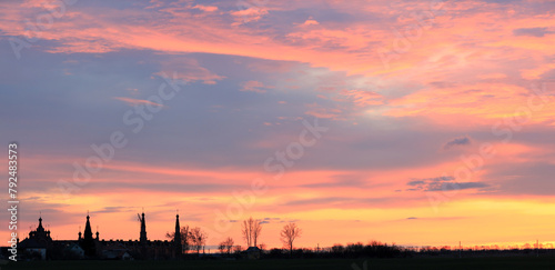 Silhouette of an Orthodox monastery against the dawn sky