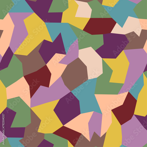 Colorful geometric camouflage vector seamless pattern. Collection of polygon-shaped fragments designed as a surface art texture that may be printed or used in graphic design.