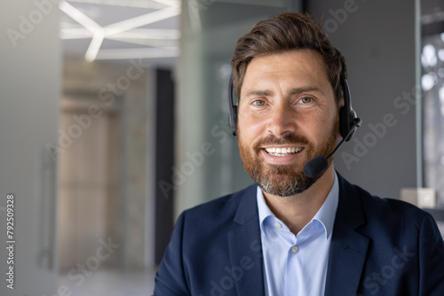 Professional customer service rep with headset in modern office photo