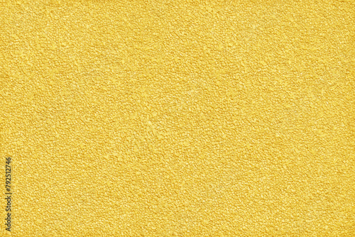 surface and texture of fine mix size gravel gold wall background