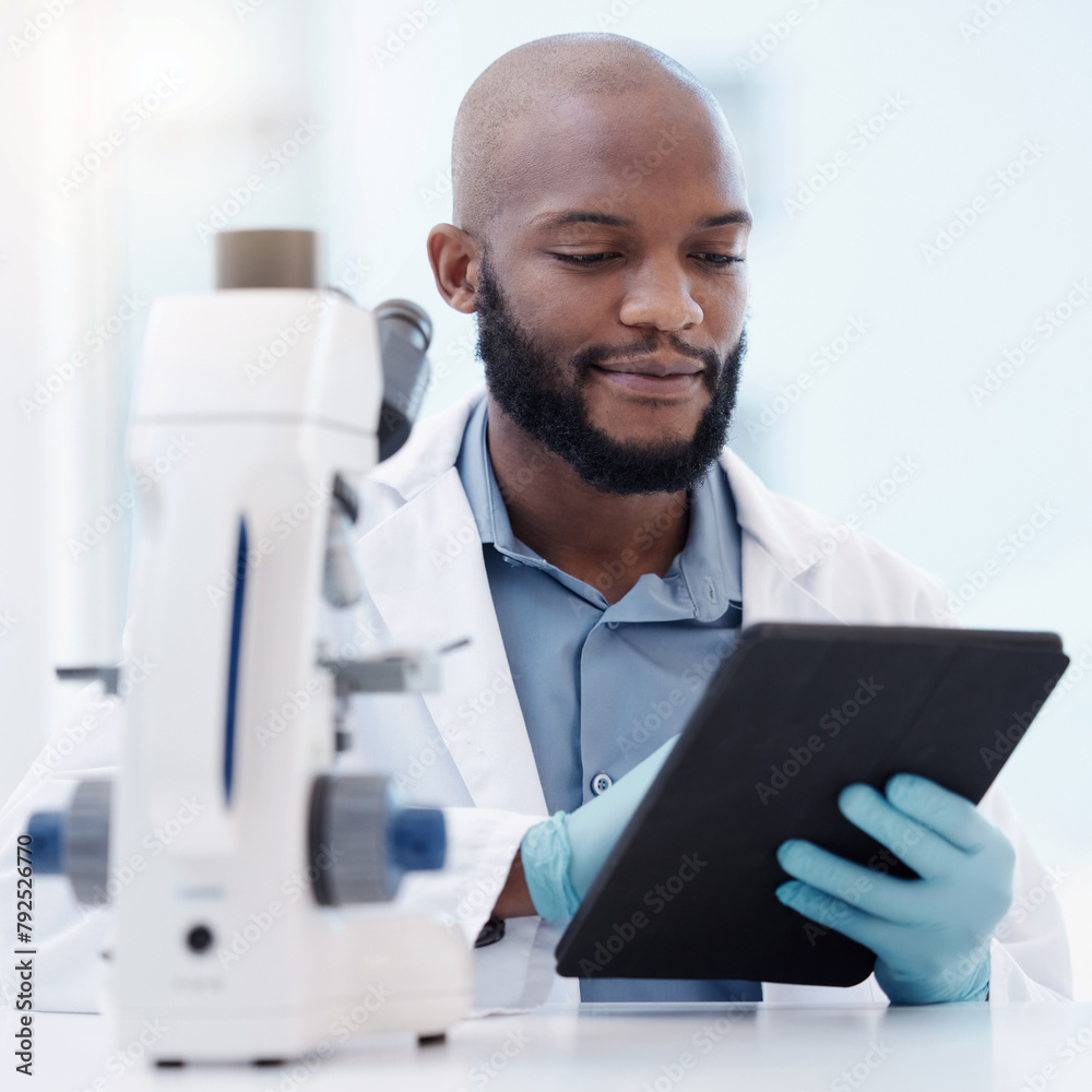 Black man, scientist and tablet in laboratory for research, innovation or healthcare with gloves for hygiene. Male person, studying or planning in lab for medical diagnosis, test or experiment - obrazy, fototapety, plakaty 