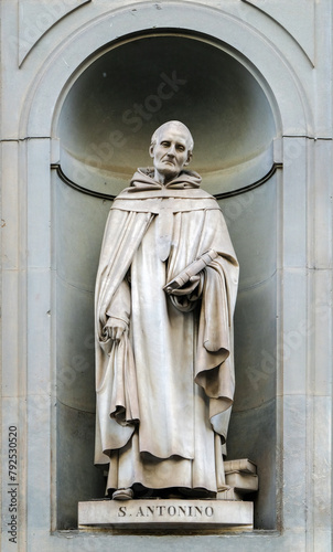 Statue of San Antonino in the niches of the Uffizi Gallery colonnade, Florence, Italy. photo
