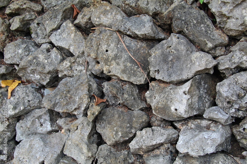 A sharp gray rock pile. Suitable for texture and background themes A sharp gray rock pile. Suitable for texture and background themes