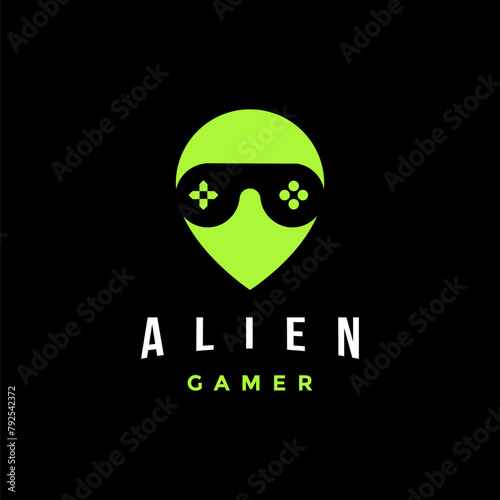 Alien gamer head with joystick as glasseye logo icon vector template on black background