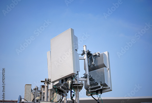 Small Cell 4G, 5G System. Macro Base Station or Base Transceiver Station. Wireless Communication Antenna Transmitter. Development of communication system in urban area on car roof.