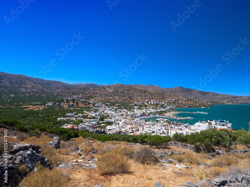 View of seaside town from the top of hill (Elounda, Crete, Greece)