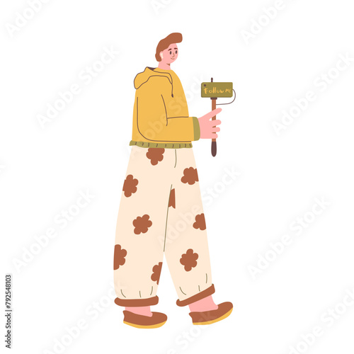 Blogger character. Modern young man with camera on stream isolated on white background. Teenager creating video for vlog. Blog and social media influencer. KOL vector illustration.